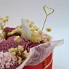 Composition florale en fondants parfumés dans un sac avec lanières