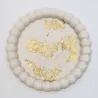 Plateau en jesmonite rond avec finition feuille d'or