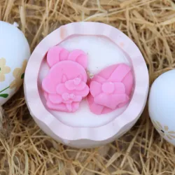 Bougie parfum fleur de coton dans coquille d'oeuf en jesmonite